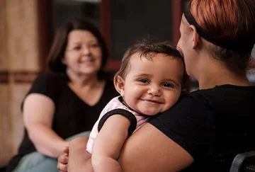 Babies feel the love at Kira House